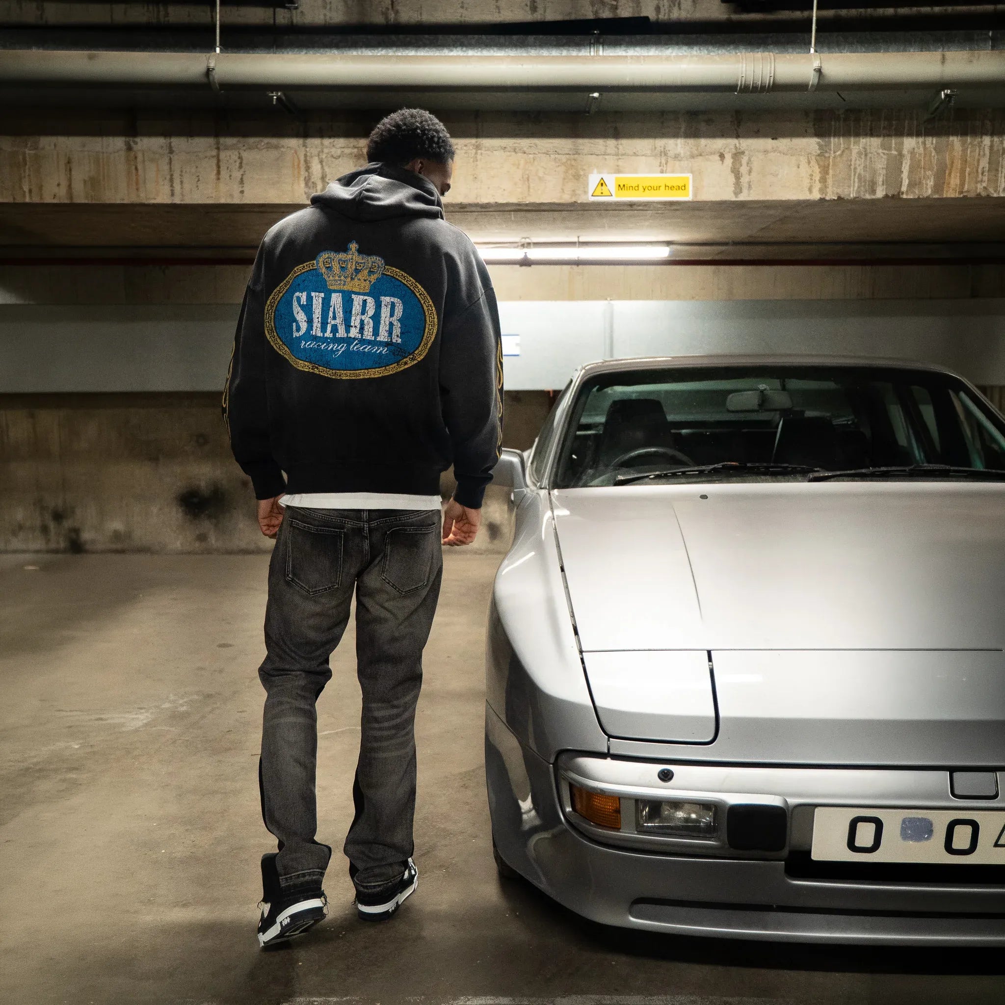 Back View of SIARR Crown Washed Black Hoodie