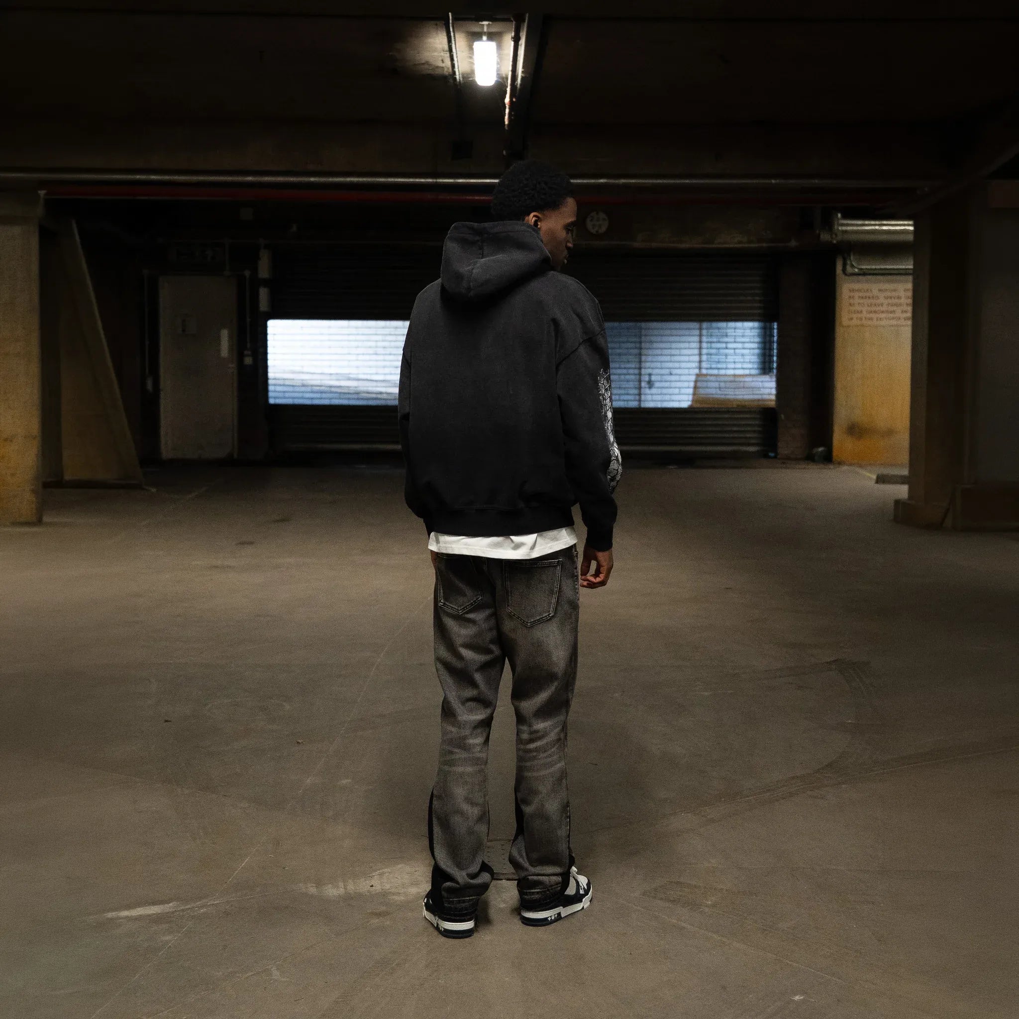 Back View of SIARR Crown Washed Black Hoodie