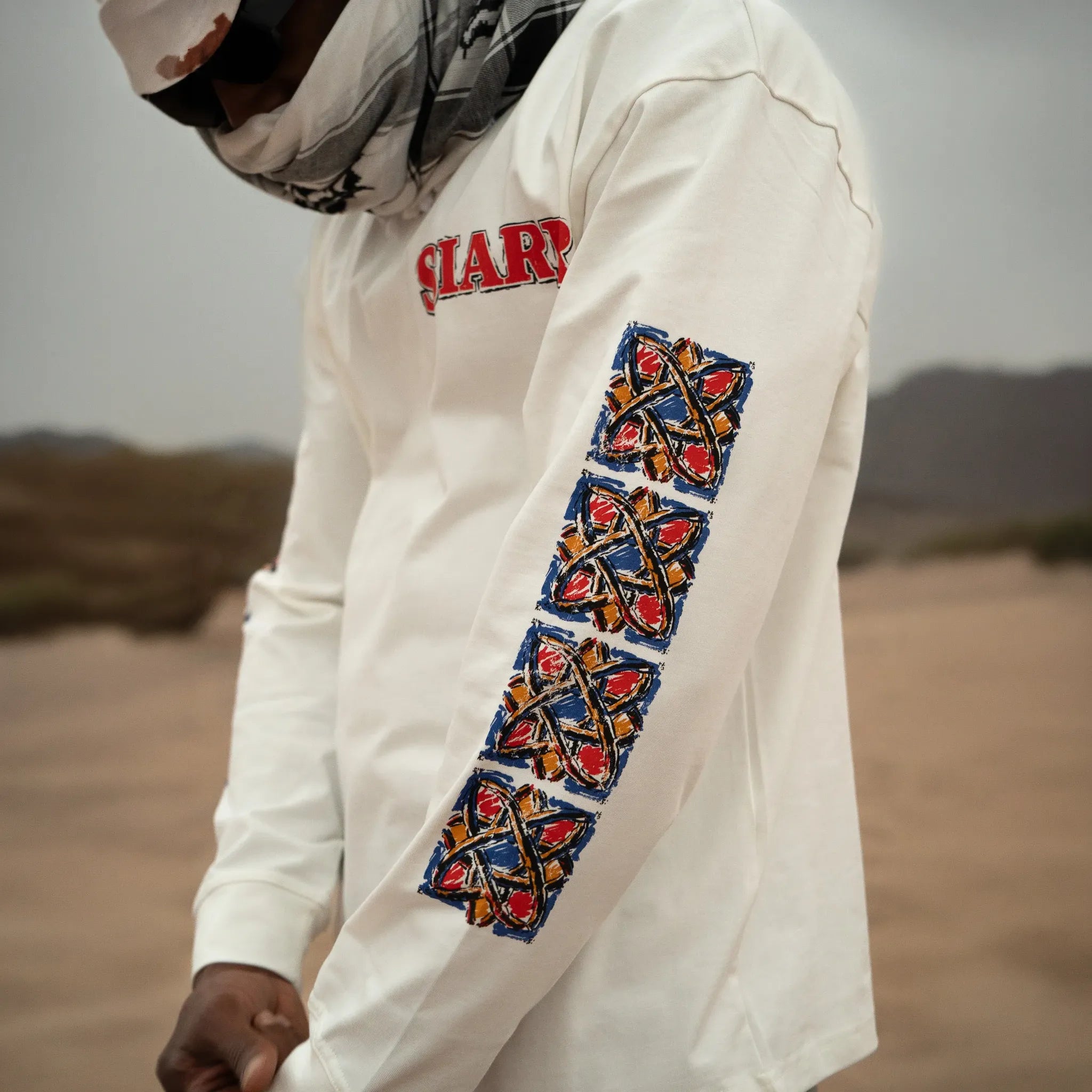 Model Front Side View of SIARR Floral L/S Off-White T-Shirt