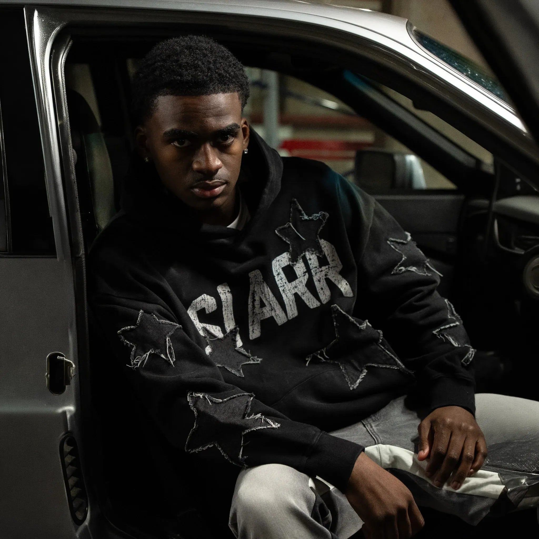 Front View of SIARR Star Washed Black Hoodie