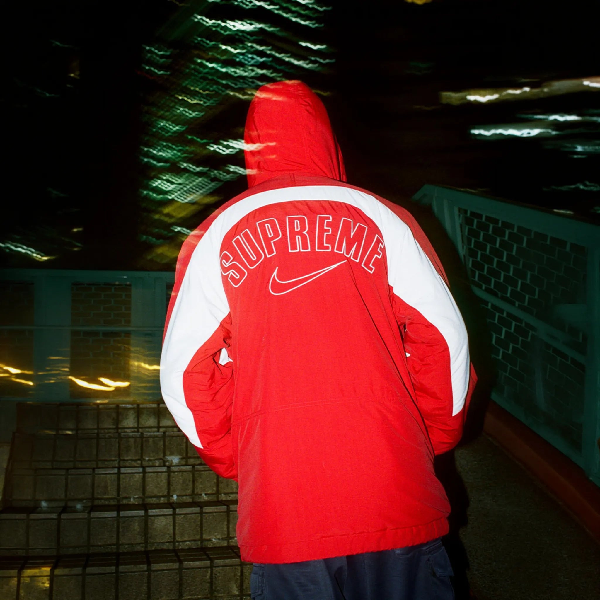 Back View of Supreme x Nike Faux Fur Reversible Parka Jacket FW26J1 RED