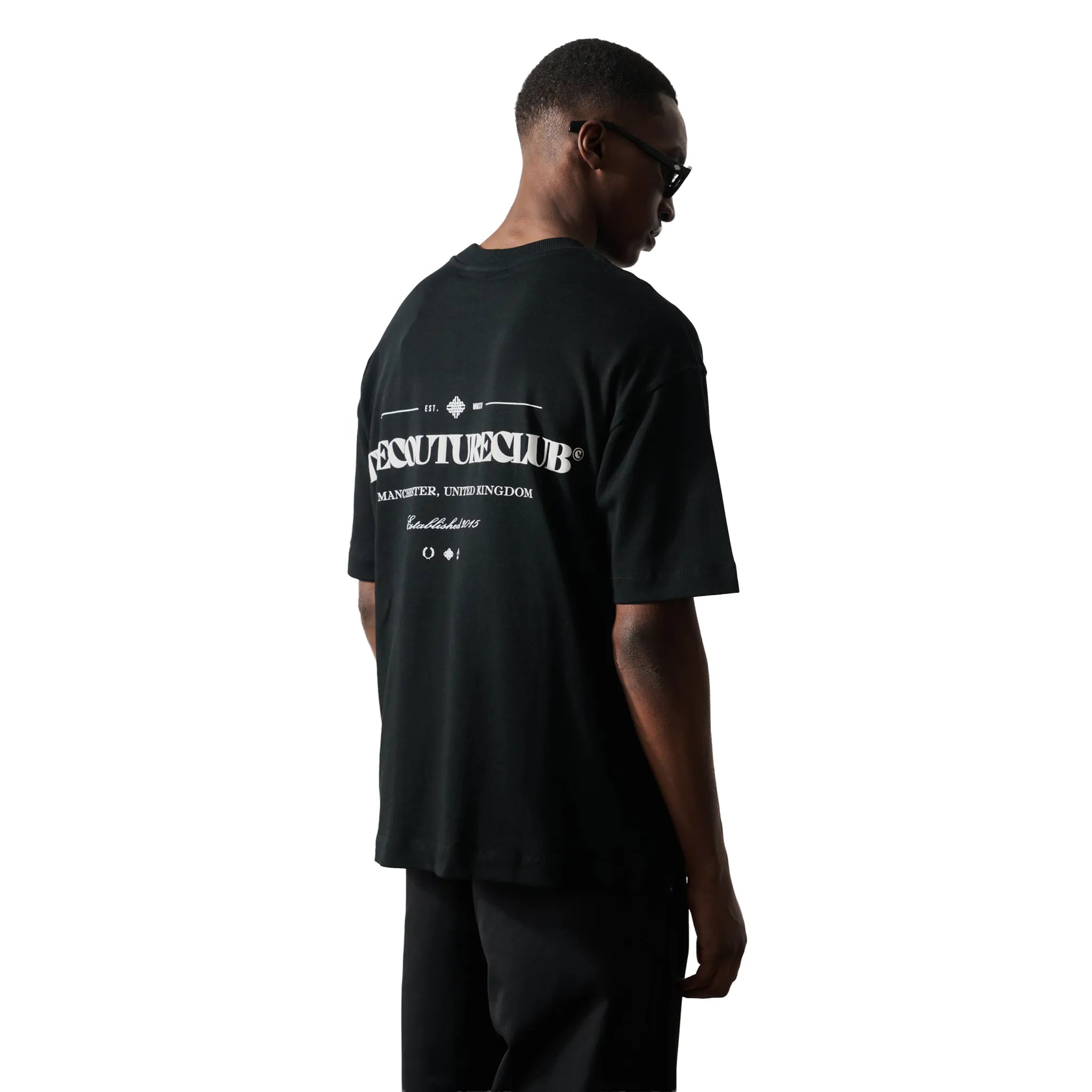 Back Side View of The Couture Club Copyright Multi Graphic Black T-Shirt