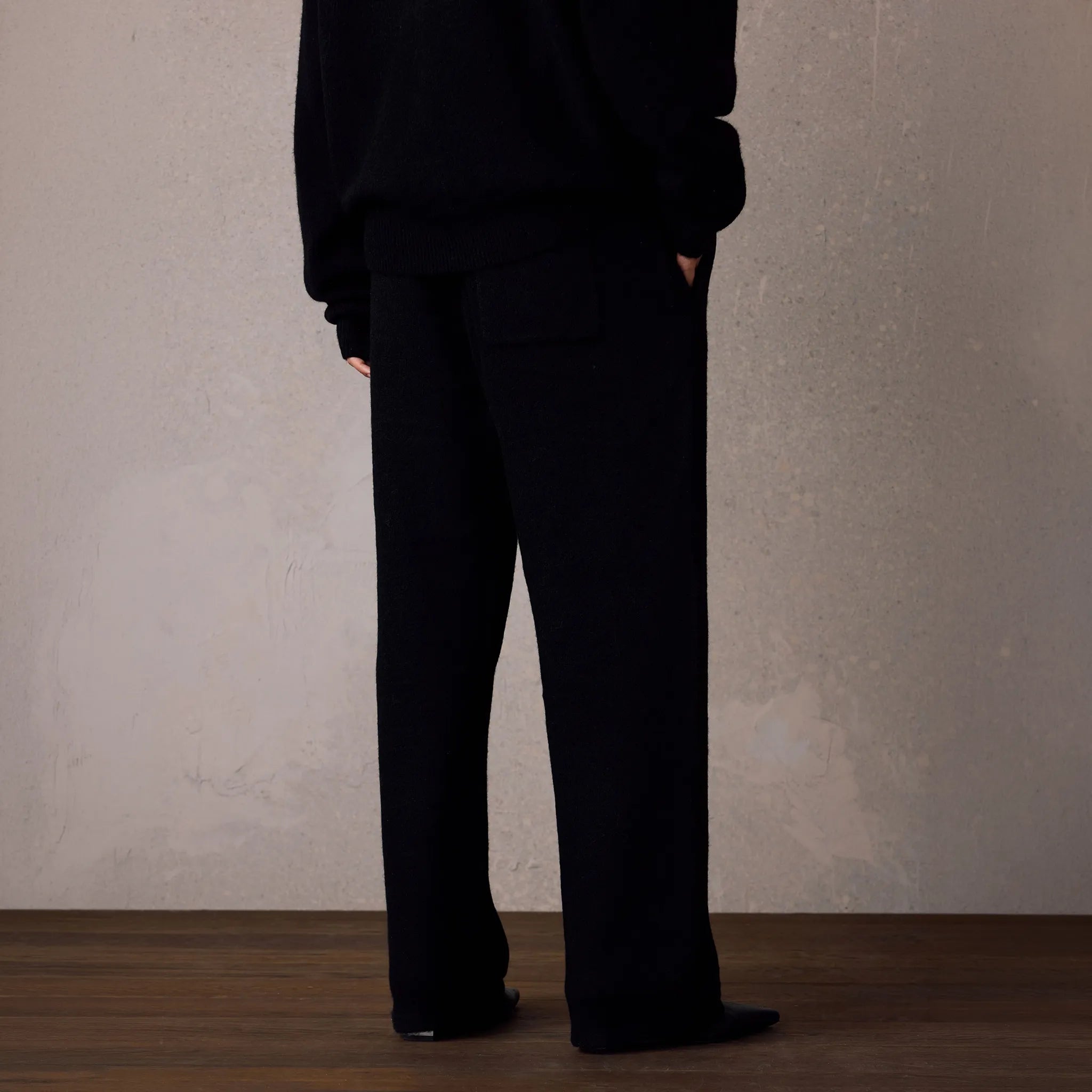 Back View of The Couture Club Emblem Fluffy Knit Black Sweatpants