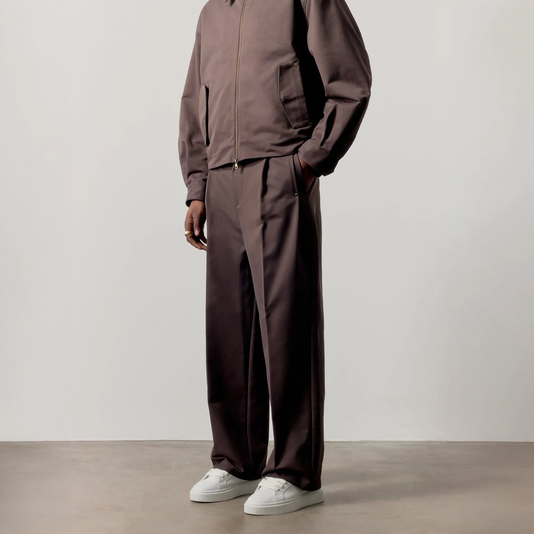 Model Front Side View of The Couture Club Rivet Detail Brown Trousers