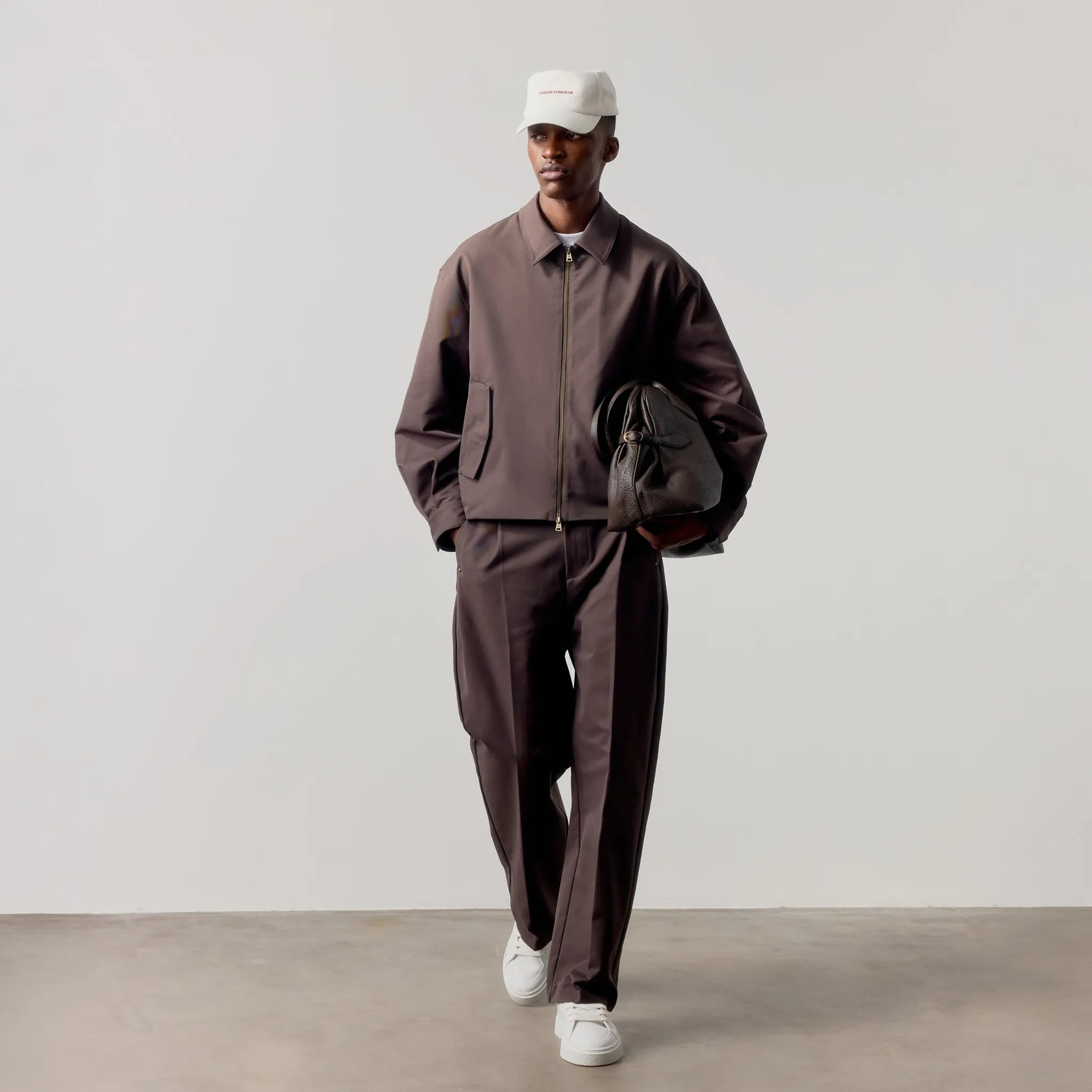 Model View of The Couture Club Rivet Detail Brown Trousers