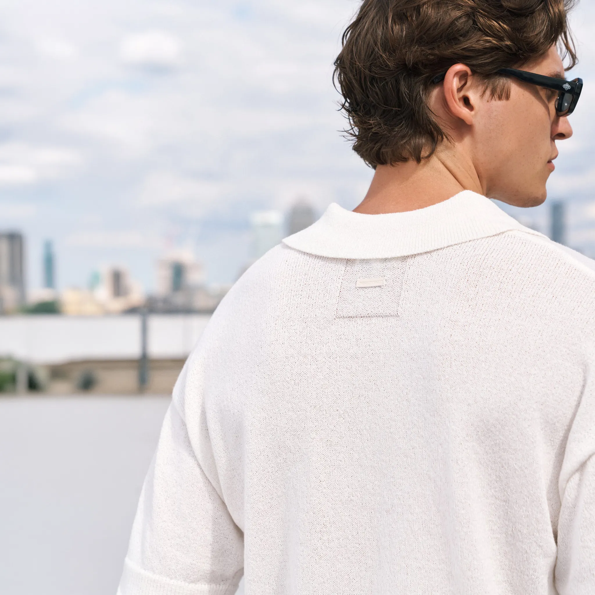 Detailed Back View of The Couture Fine Gauge Knitted White Polo Shirt