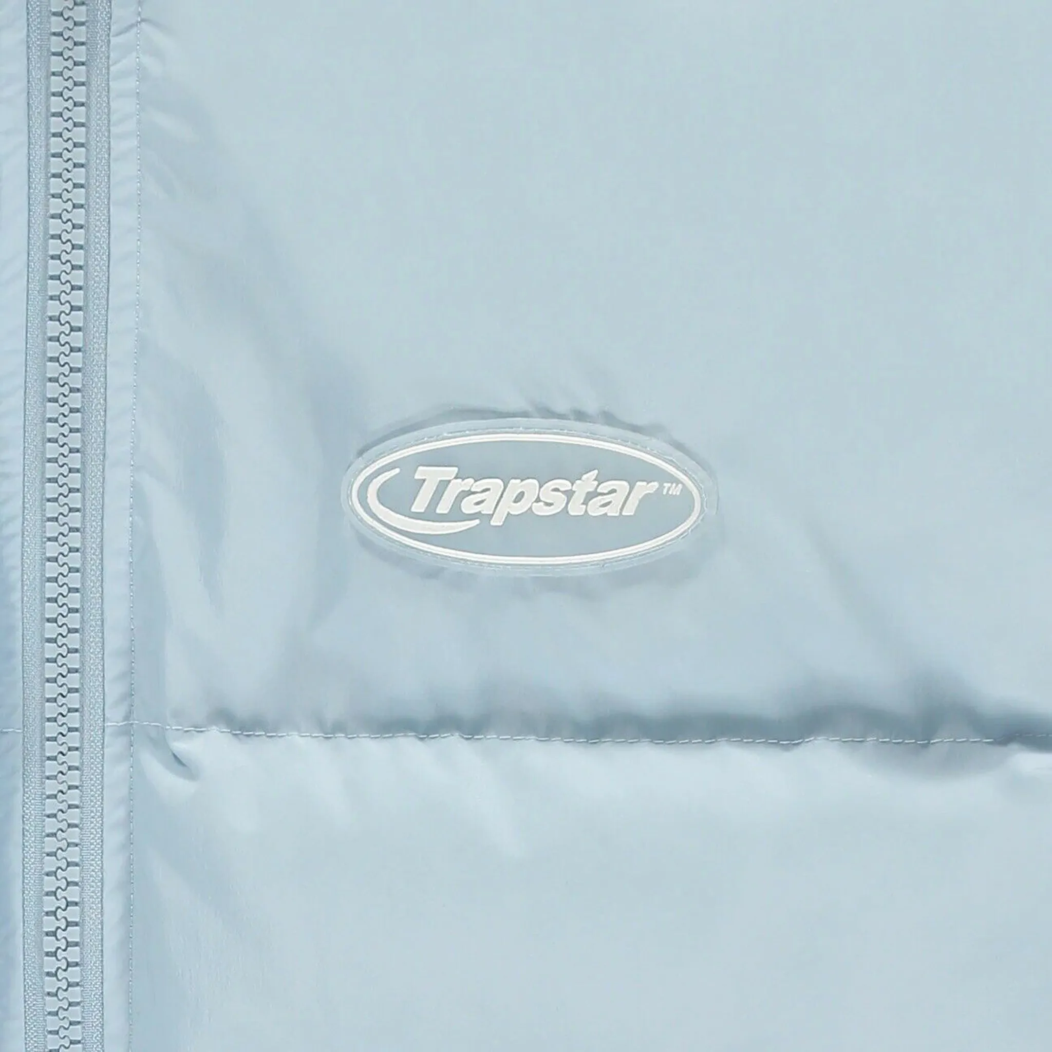 Chest logo view of Trapstar Hyperdrive Puffer Sky Blue Jacket