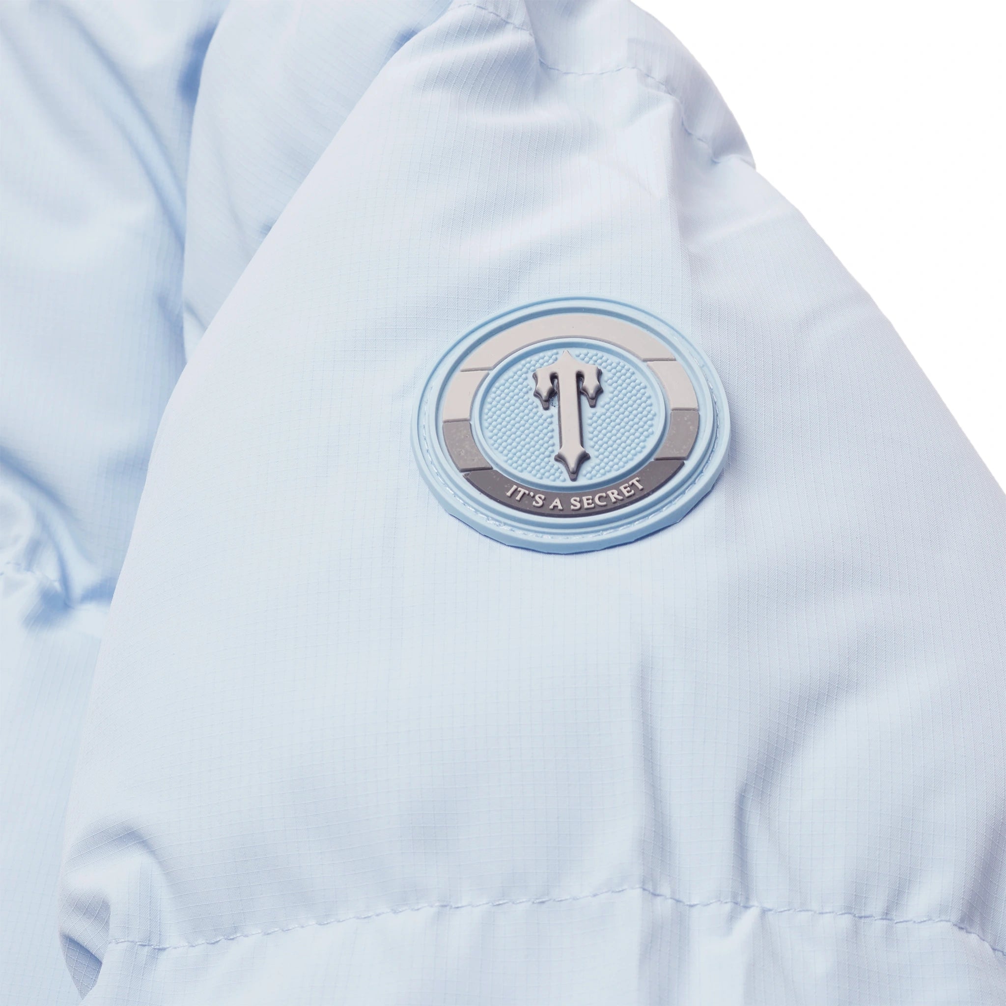 Logo view of Trapstar Womens Decoded 2.0 Ice Blue Puffer Jacket